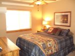 Main level bedroom 1 with queen bed
